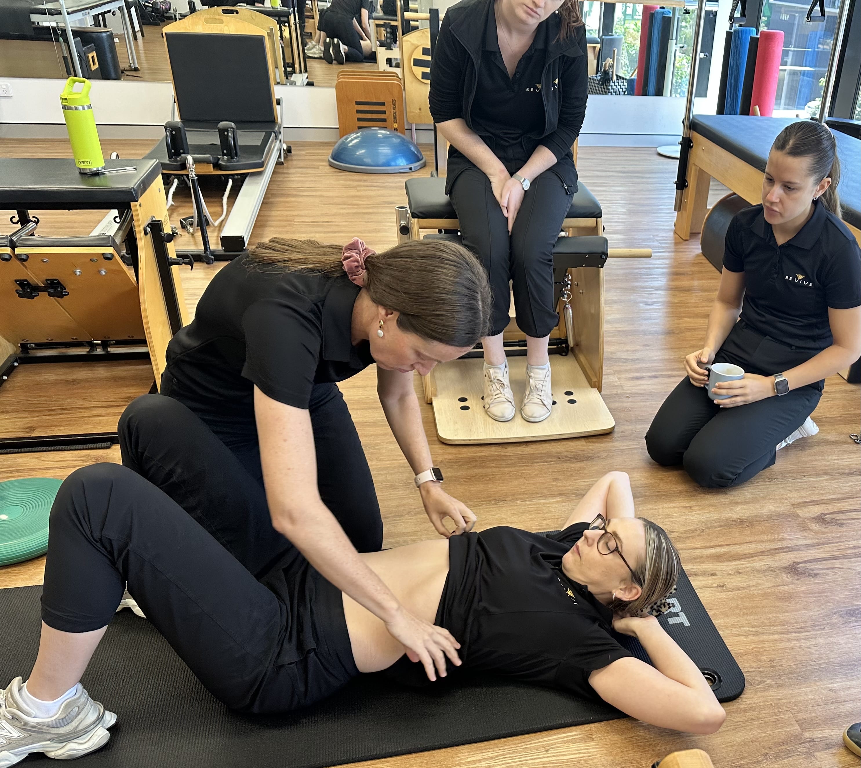 Woman running after pregnancy with proper pelvic floor support